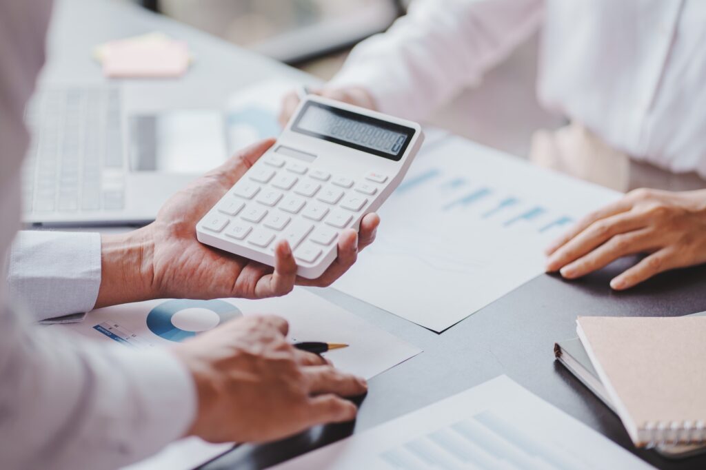 The financiers are calculating personal taxes for their customers.